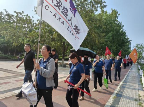 7.8|工银安盛人寿济宁中支参与“7.8全国保险公众宣传日健步行”活动